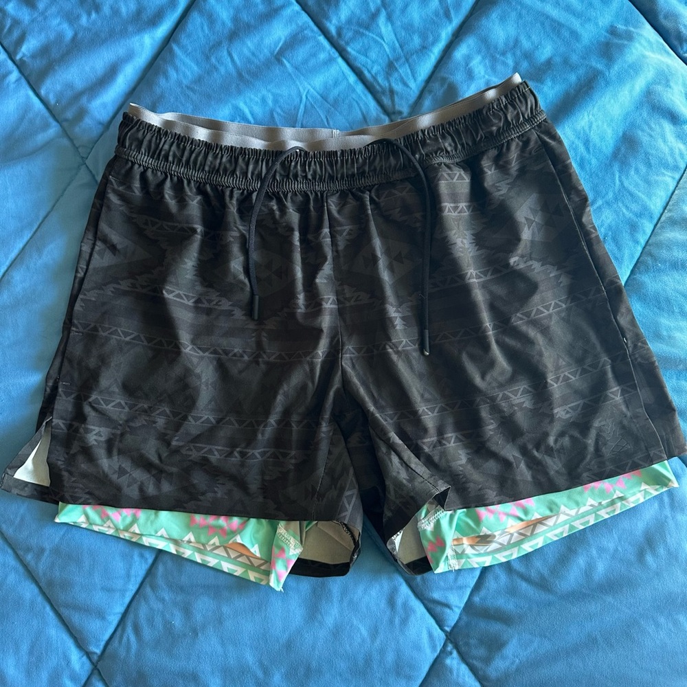 Chubbies Medium 4” inseam black shorts with multicolor lining Zipper back pocket